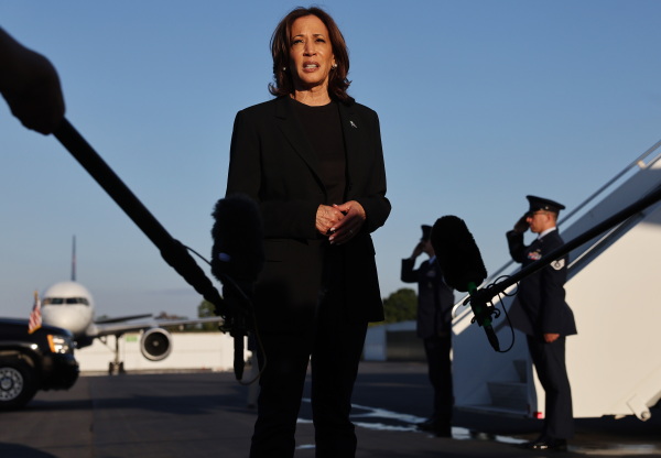Vice President Harris speaks to the media before boarding Air Force Two after assessing the Hurricane Helene recovery response in North Carolina on Oct. 5. Some political pundits have described the storm as an October surprise.