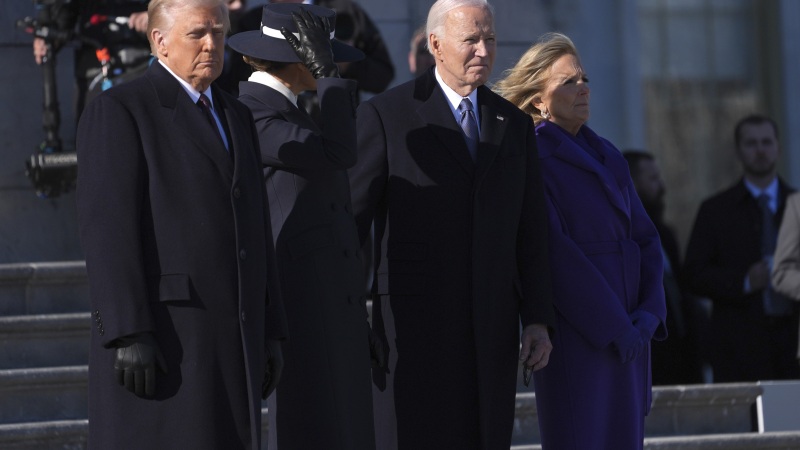 President Trump and first lady Melania Trump stand before sending off former President Joe Biden and Jill Biden to board a Marine helicopter en route to Joint Base Andrews after the inauguration on Jan. 20, at the U.S. Capitol in Washington. 