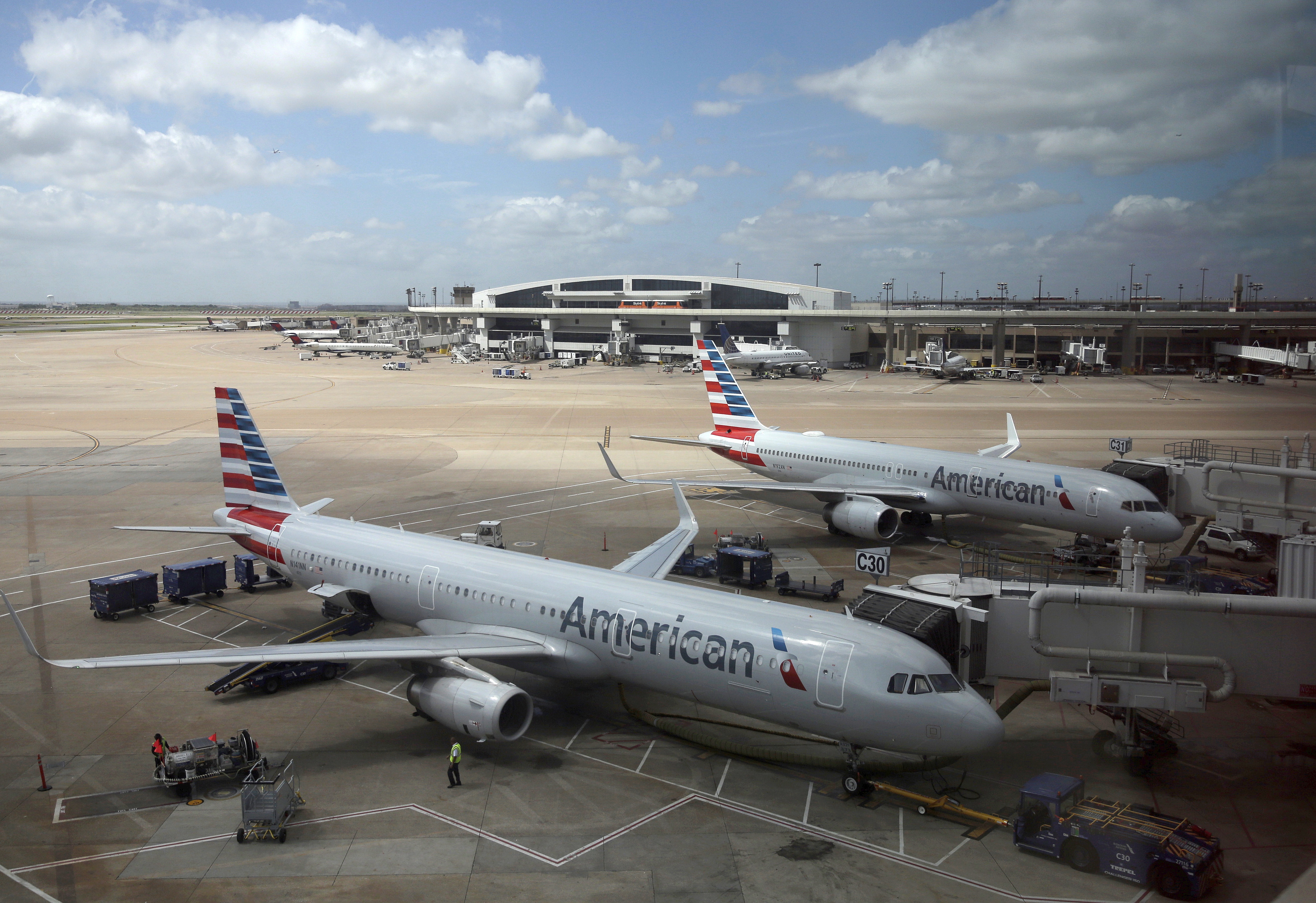 American Airlines faces a discrimination suit after removing 8 Black men from flight
