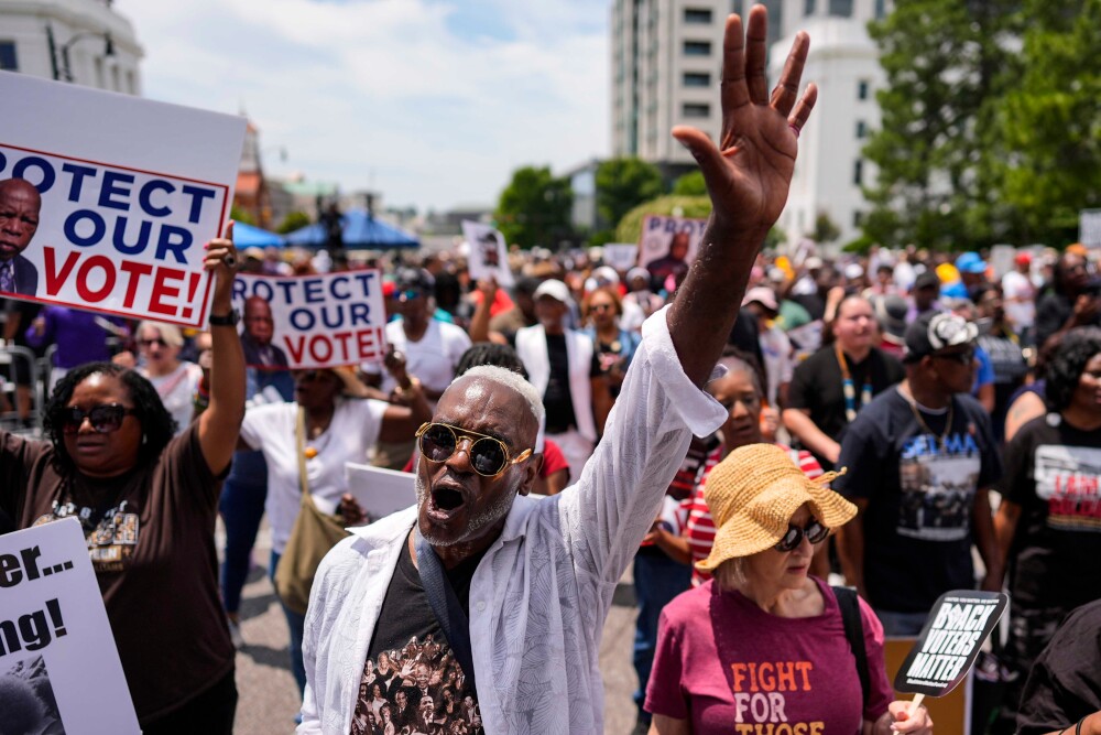 A man sings a spirtual song during a voting rally, Saturday, May 16, 2026, in Montgomery, Ala. (AP)