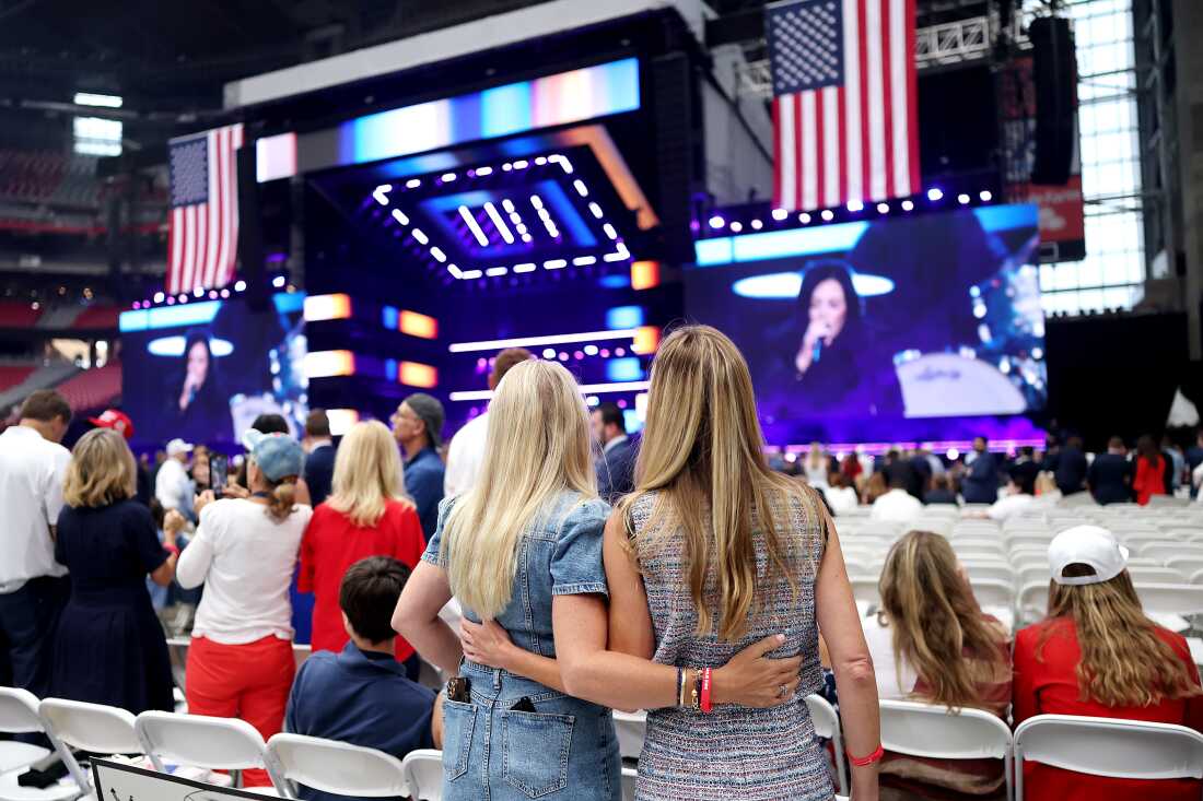 Attendees await the start of the memorial service for political activist Charlie Kirk at State Farm Stadium on September 21, 2025 in Glendale, Arizona.