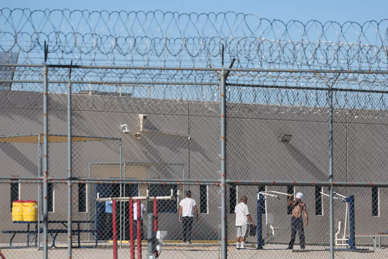People detained are seen at the the Desert View Annex at the the private prison company GEO Group Adelanto ICE Processing Center detention facility in Adelanto, Calif., in July 2025.