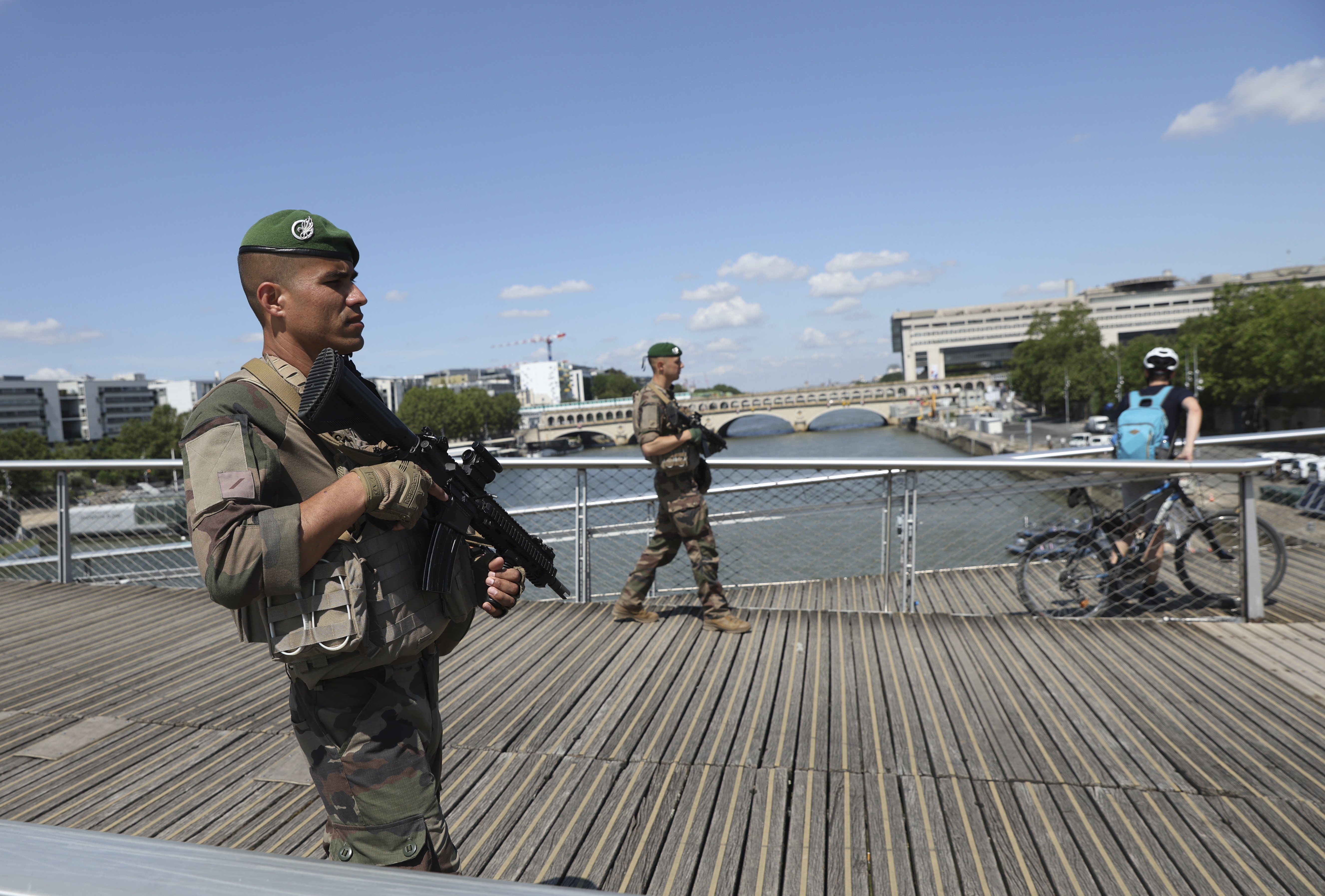 Soldiers patrol on a footbridge over the Seine River on Wednesday in Paris. (AP)