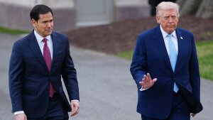 President Trump walks with Secretary of State Marco Rubio to speak with reporters before departing on Marine One from the South Lawn of the White House, March 20.