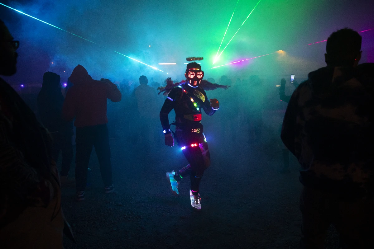 Kevin Hernandez, known as HAPPYTEARS, dances while wearing a halo and light up wings, during a renegade rave under a bridge on Oct. 11, in Seattle. Full story here.