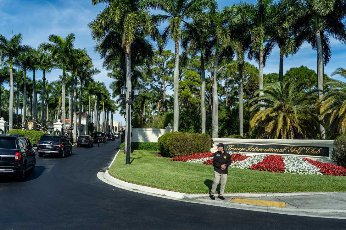 FILE - The motorcade for President Donald Trump arrives at Trump International Golf Club, Jan. 2, 2026, in West Palm Beach, Fla.