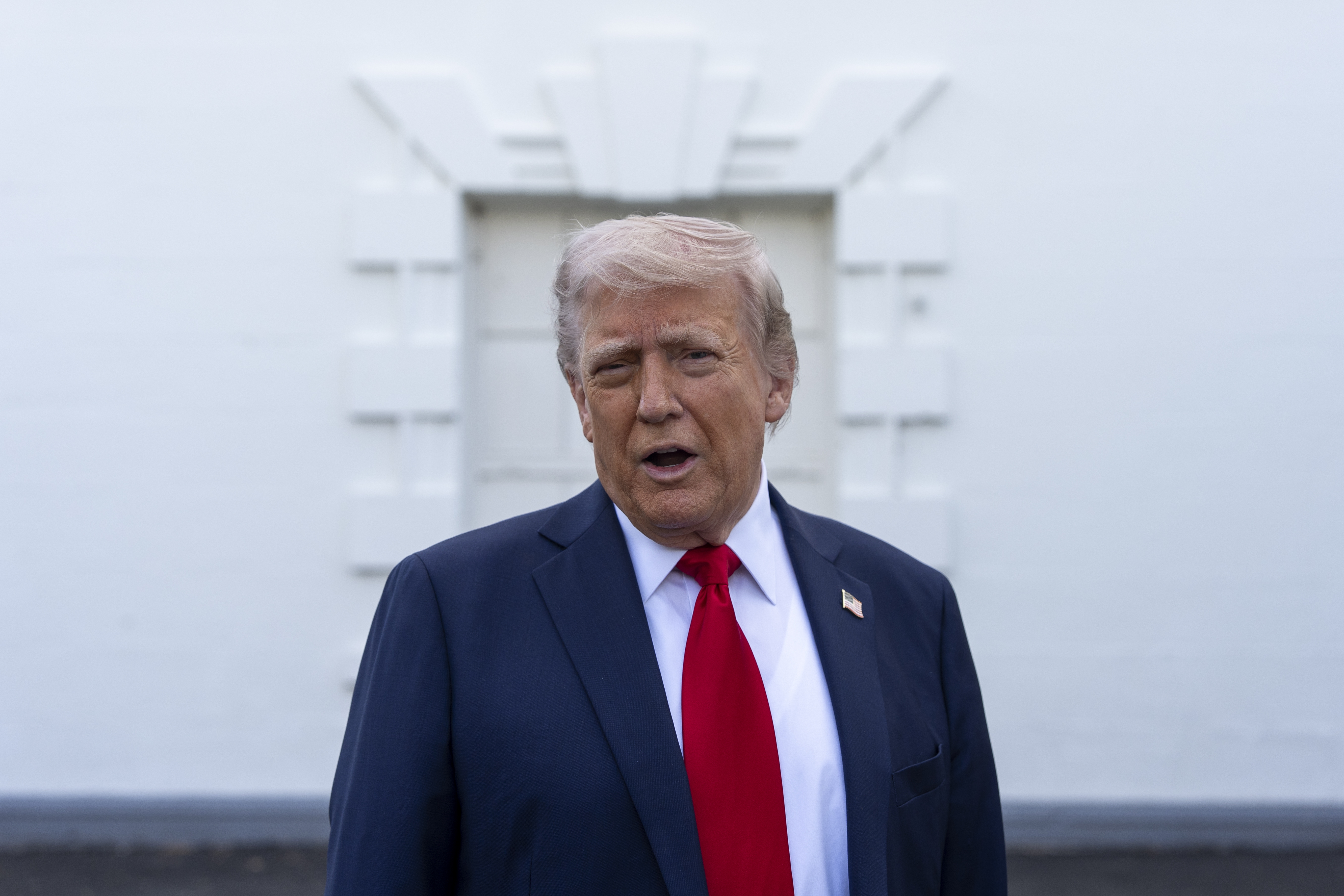 President Donald Trump speaks with reporters at the White House on Wednesday in Washington. 
