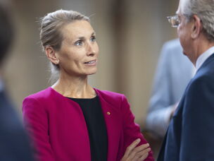 State Sen. Christy Armendariz chats with a colleague on the legislative floor of the Nebraska State Capitol in 2024, in Lincoln, Neb.
