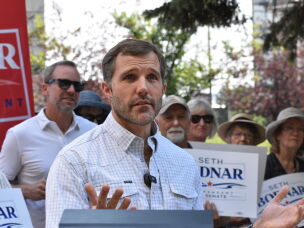 Seth Bodnar, an independent candidate for a U.S. Senate seat in Montana, speaks to supporters and the press outside the Yellowstone County Courthouse, Aug. 7, in Billings, Mont.