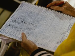 A fan's rain-soaked scorecard on the WPBL's opening day.