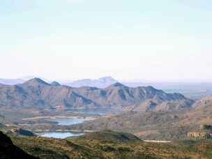 Water from the Verde River fills Bartlett Reservoir in the mountains east of Phoenix on April 23, 2026. Water managers say they will be able to weather big cuts to Colorado River supplies partially because they can draw water from other nearby reservoirs.