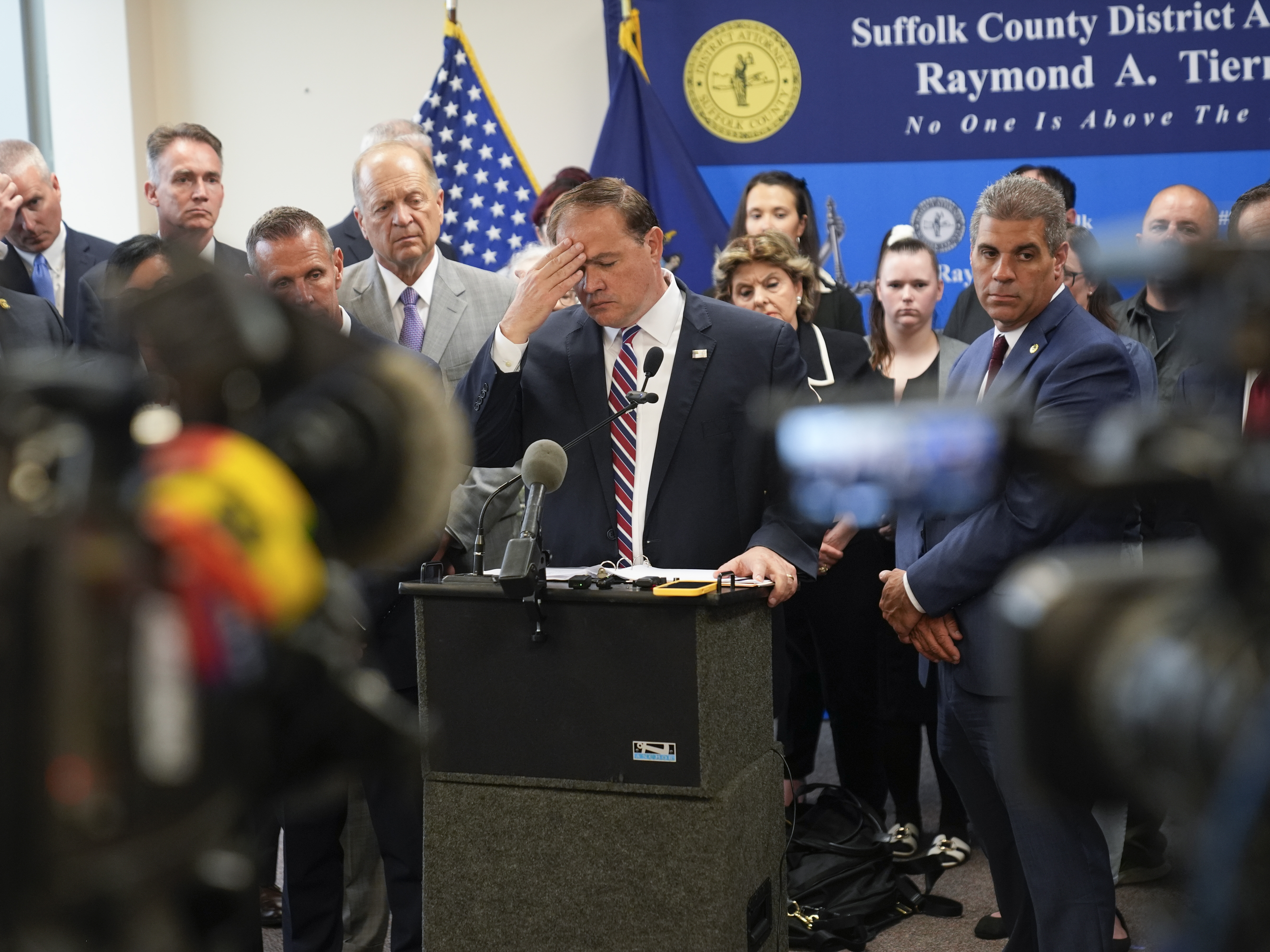 Surrounded by law enforcement, victims