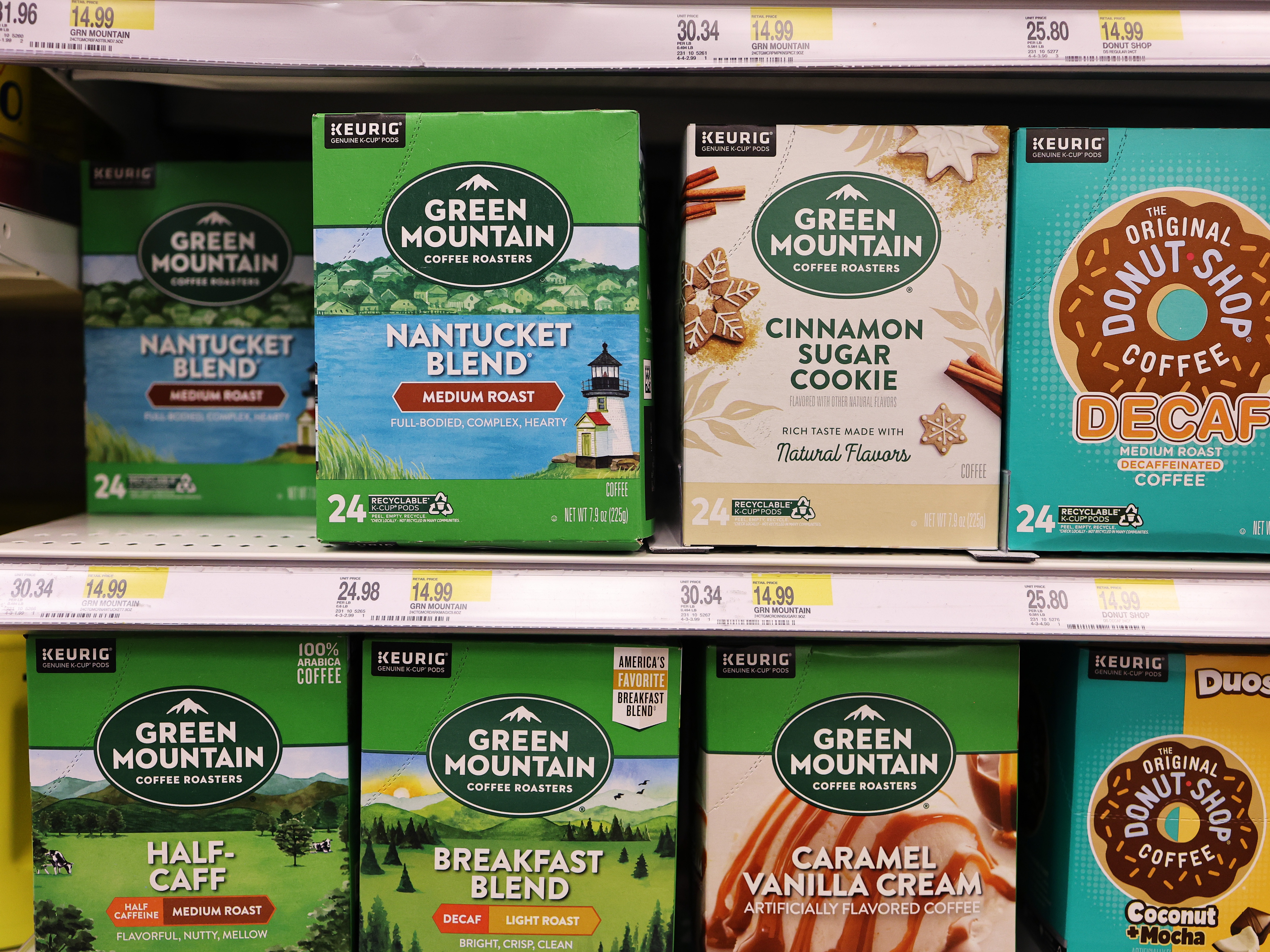 Boxes of Green Mountain Keurig coffee K-Cup pods are seen on display at a Target store. The Securities and Exchange Commission has announced that they are charging Keurig Dr Pepper over inaccurate claims made by the company about the recyclability of its disposable K-Cup pods. Keurig misled the public over claims its K-Cup pods are 100% recyclable, the SEC says