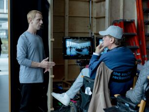 Writer/director Aaron Sorkin, right, calls Jeremy Strong, right, 