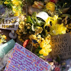 Yellow flowers and handwritten notes calling for the return of Nancy Guthrie sit outside the house of the 84-year-old mother of Today show co-host Savannah Guthrie, in Tucson, Ariz. Savannah Guthrie is speaking about her mother in an emotional two-part interview.