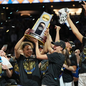 UCLA players celebrate after defeating South Carolina in the women's National Championship Final Four NCAA college basketball tournament game on Sunday in Phoenix.