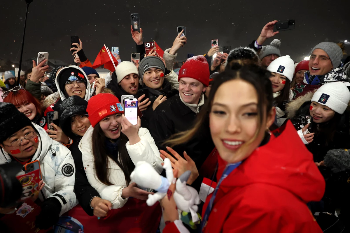 Fans crowd around Eileen Gu at the Women's Freeski Big Air competition during the Milan Cortina 2026 Winter Olympic games in Livigno, Italy, on Feb. 16.