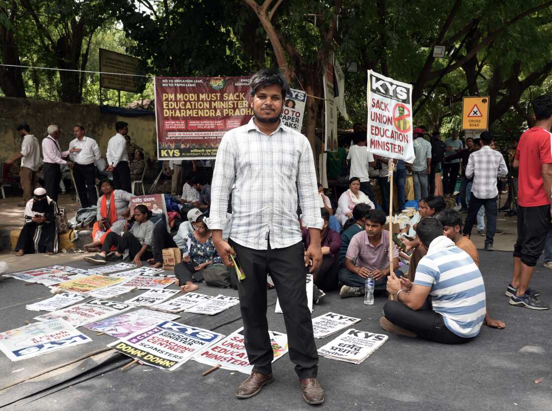 Shams Tabrez, seen at the New Delhi protest on June 25, says he could not qualify to be a public school teacher because he alleges the recruitment officials sought a bribe, which he refused to pay.
