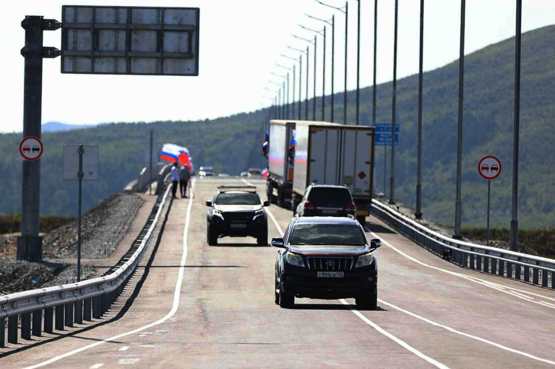 In this photo released by the Government of Primorsky Krai Region on Monday, Sept. 7, 2026, vehicles drive across the new bridge between Russia and North Korea named after the Soviet officer Yakov Novichenko, who is credited with saving North Korea's founding leader, Kim Il-sung, over the Tumannaya River in Primorsky Krai Region of Russia.