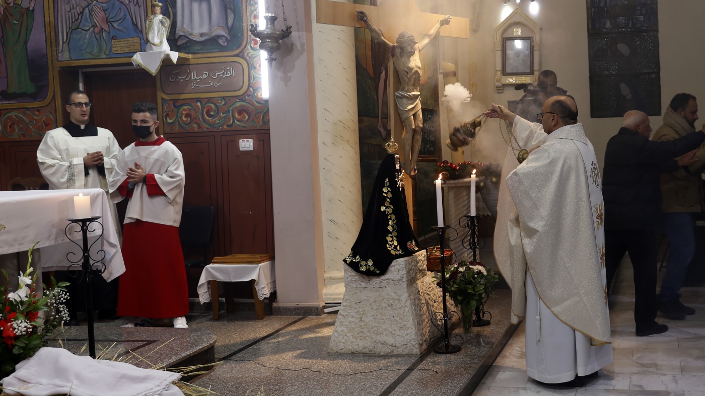 Israel hits a Gaza church, killing 3 and wounding a priest who spoke to Pope Francis