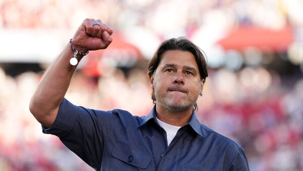 U.S. men's national team coach Mauricio Pochettino holds his fist up. 