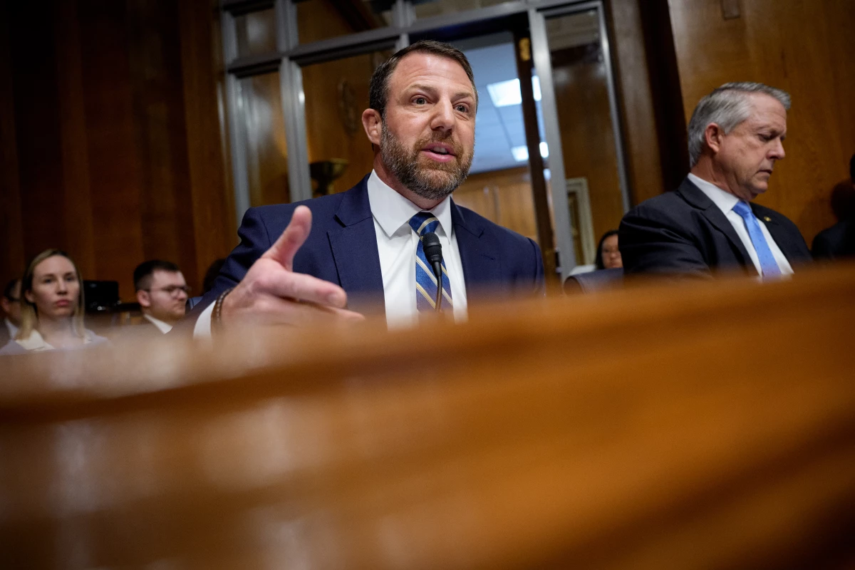 Sen. Markwayne Mullin, R-Okla., (left), speaks during a Senate Health, Education, Labor and Pensions Committee hearing on last month.