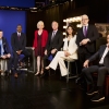 Correspondents of CBS' 60 Minutes pose for a portrait in 2023. From left to right, they are Sharyn Alfonsi, L. Jon Wertheim, Bill Whitaker, Lesley Stahl, Scott Pelley, Cecilia Vega, and Anderson Cooper. Former Executive Producer Bill Owens sits on the far right. Only Wertheim, Whitaker and Stahl remain on the program.