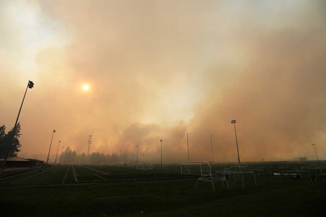 Old Trails Fire is seen from Dwight Merkel Sports Complex, Saturday, Aug. 1, 2026, in Spokane, Wash.