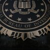 The J. Edgar Hoover building's FBI seal pictured in March in Washington, D.C. Dan Bongino, deputy director of the FBI, announced the bureau’s renewed efforts around three cases on Monday.