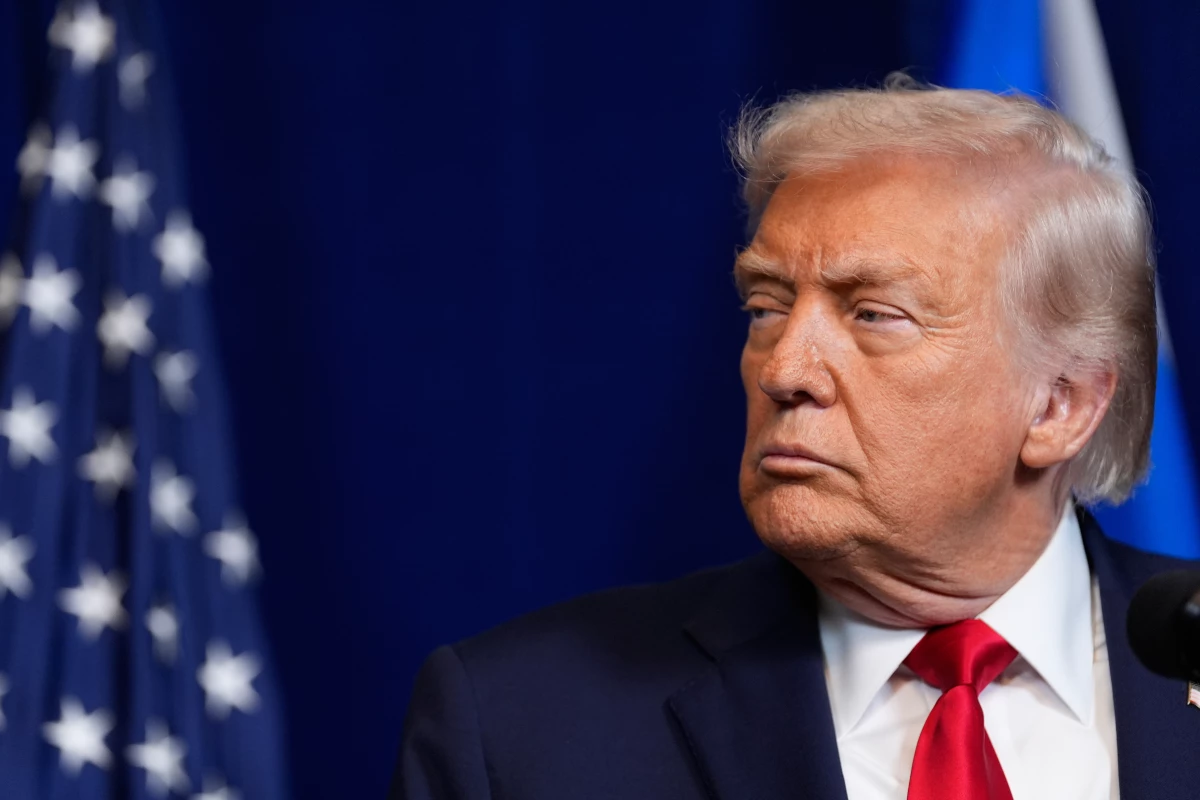 President Trump listens during a news conference with Israel's Prime Minister Benjamin Netanyahu at Mar-a-Lago on Monday in Palm Beach, Fla.