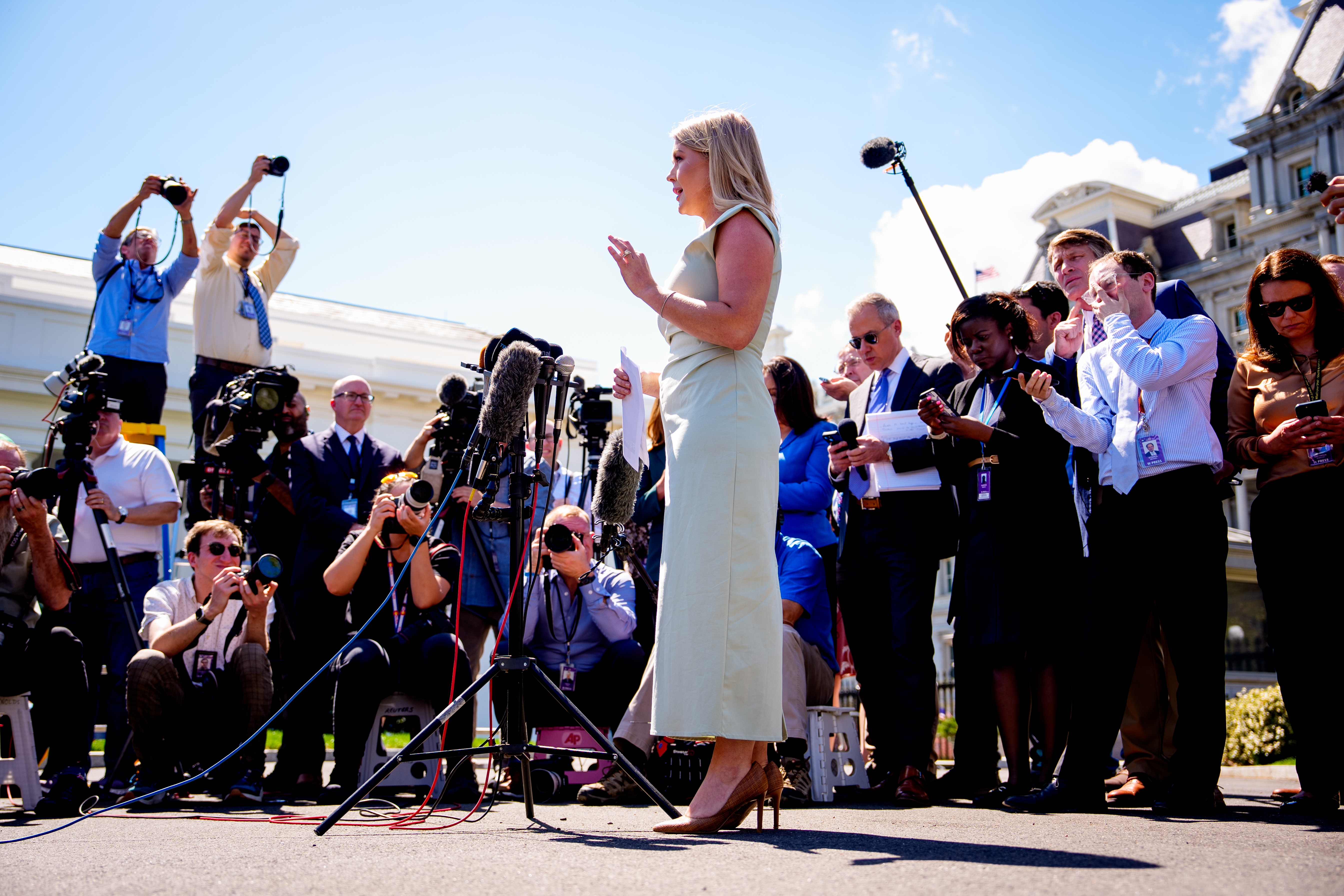 White House press secretary Karoline Leavitt speaks to reporters on the White House driveway on March 31, 2025.