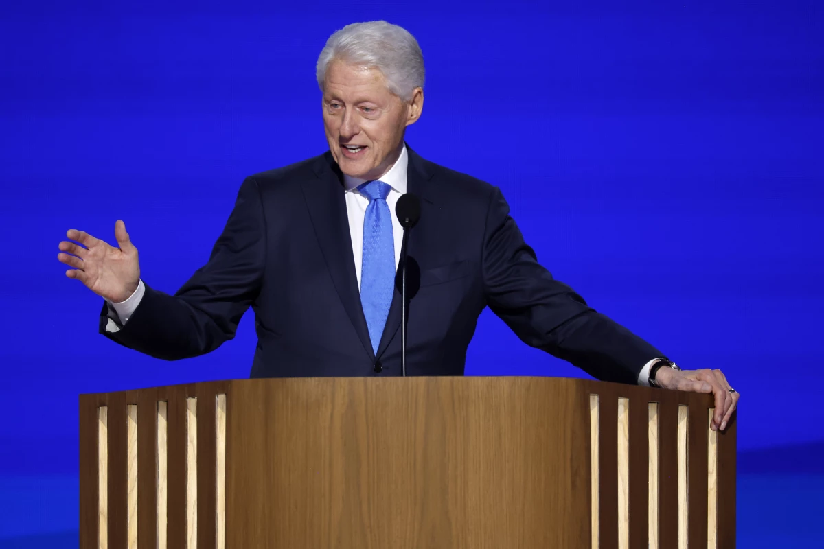 Former U.S. President Bill Clinton speaks on stage during the third day of the Democratic National Convention in Chicago, Illinois.