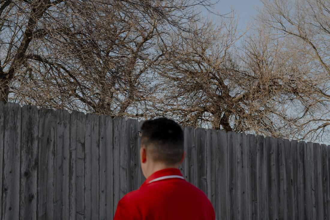 Richie poses for a portrait behind a restaurant, Saturday, Dec. 21, 2024, in Fremont, Nebraska.