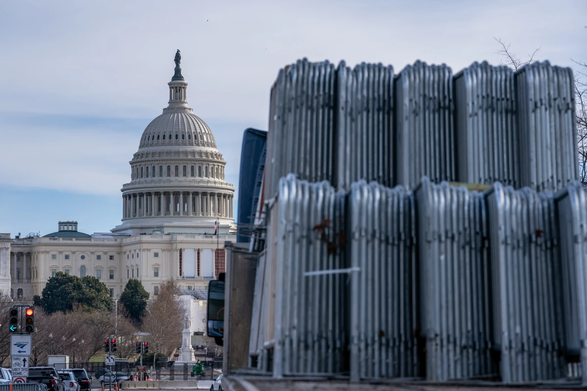 Security fencing is stacked Sunday near the U.S. Capitol ahead of the Jan. 6 certification of the 2024 presidential election.