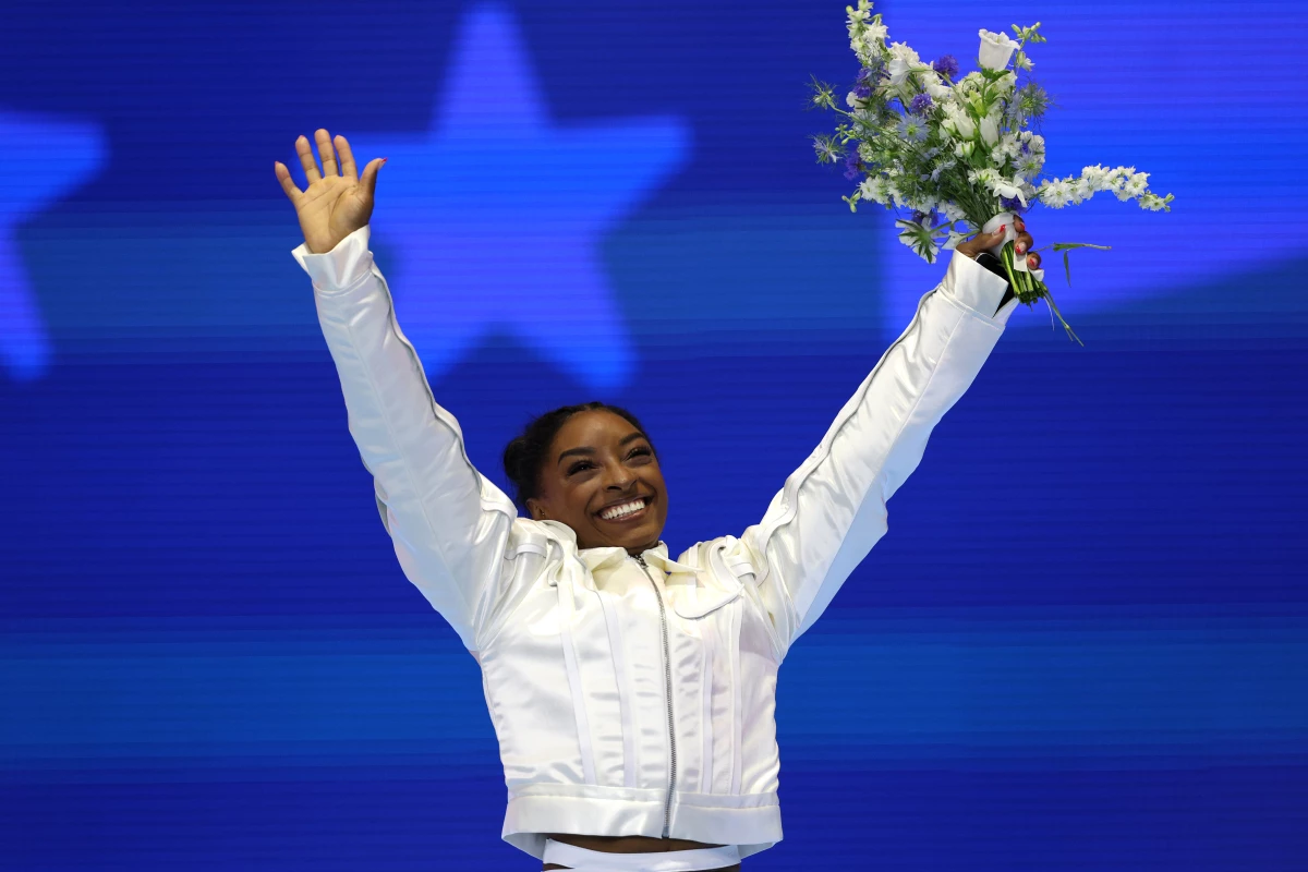 Simone Biles celebrates after being selected for the 2024 U.S. Olympic Women's Gymnastics Team on Day Four of the 2024 U.S. Olympic Team Gymnastics Trials on June 30 in Minneapolis.