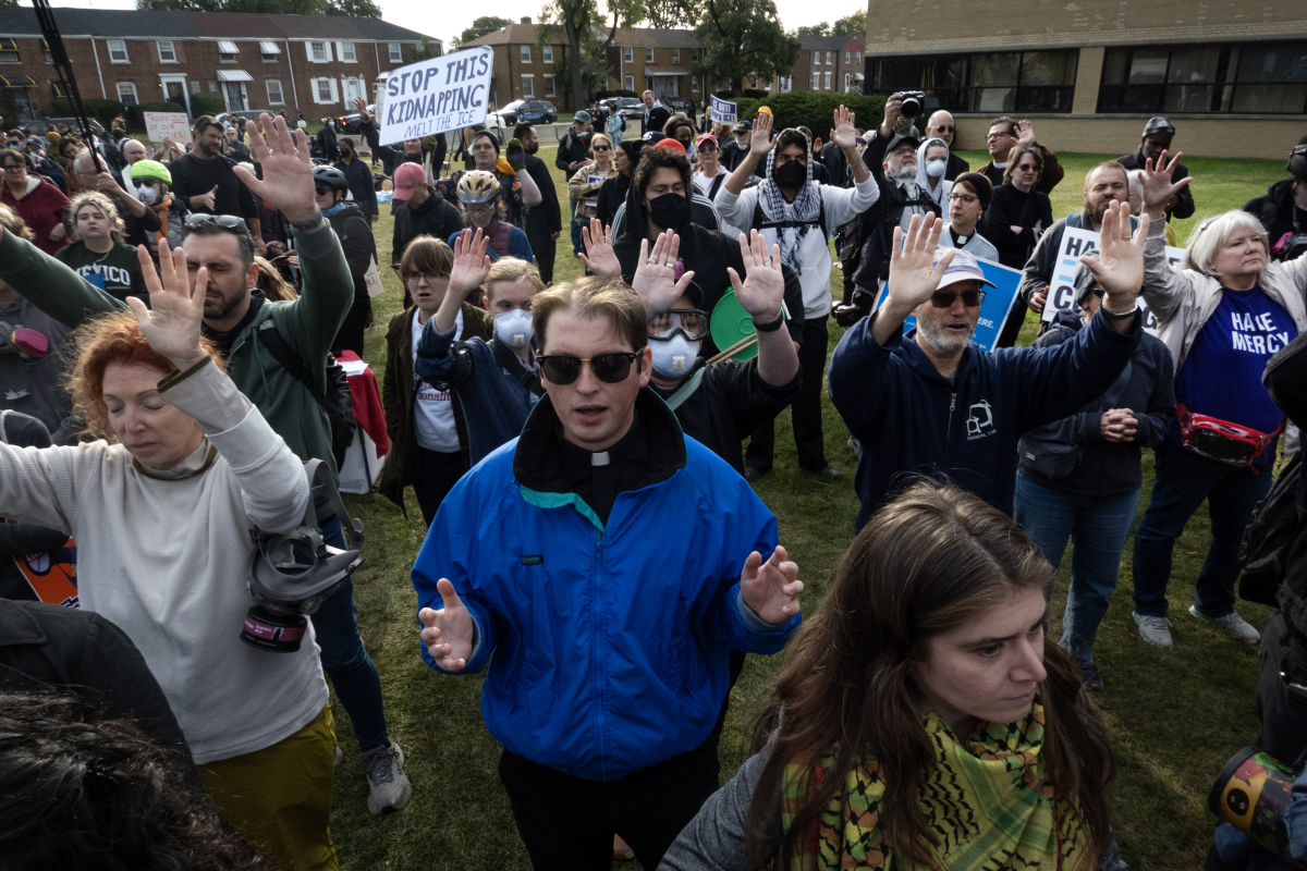 Demonstrators, including many clergy, protest near the immigration processing and detention facility on Oct. 10, 2025 in Broadview, Illinois.