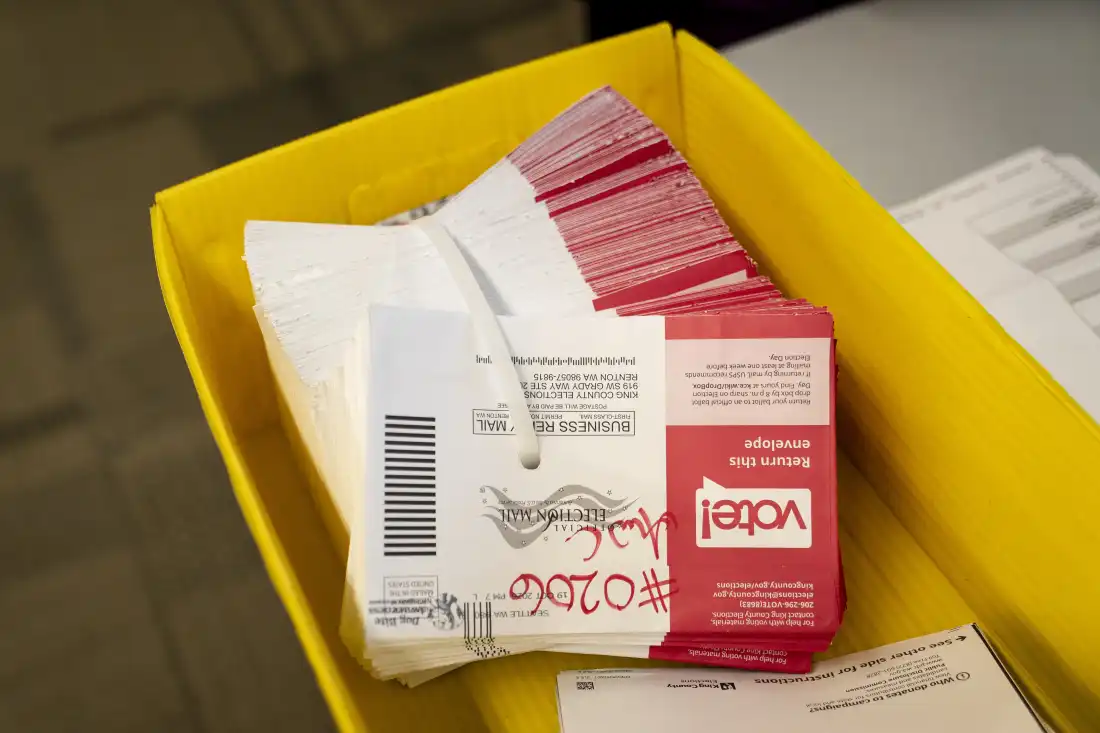 Opened ballot envelopes sit in a bin during the processing of ballots for the midterm elections at the King County Elections headquarters on October 23, 2026 in Renton, Washington. Workers have already begun processing ballots in Washington, which uses mail-in voting.