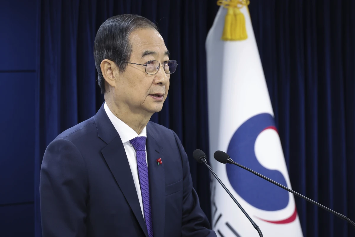 South Korean acting President Han Duck-soo speaks at the government complex in Seoul, South Korea, Thursday, Dec. 26, 2024.