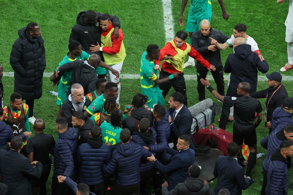 Players from both sides clash after a controversial penalty was awarded to Morocco late on during the Africa Cup of Nations final soccer match between Senegal and Morocco in Rabat, Morocco, Sunday, Jan. 18, 2026. (AP)