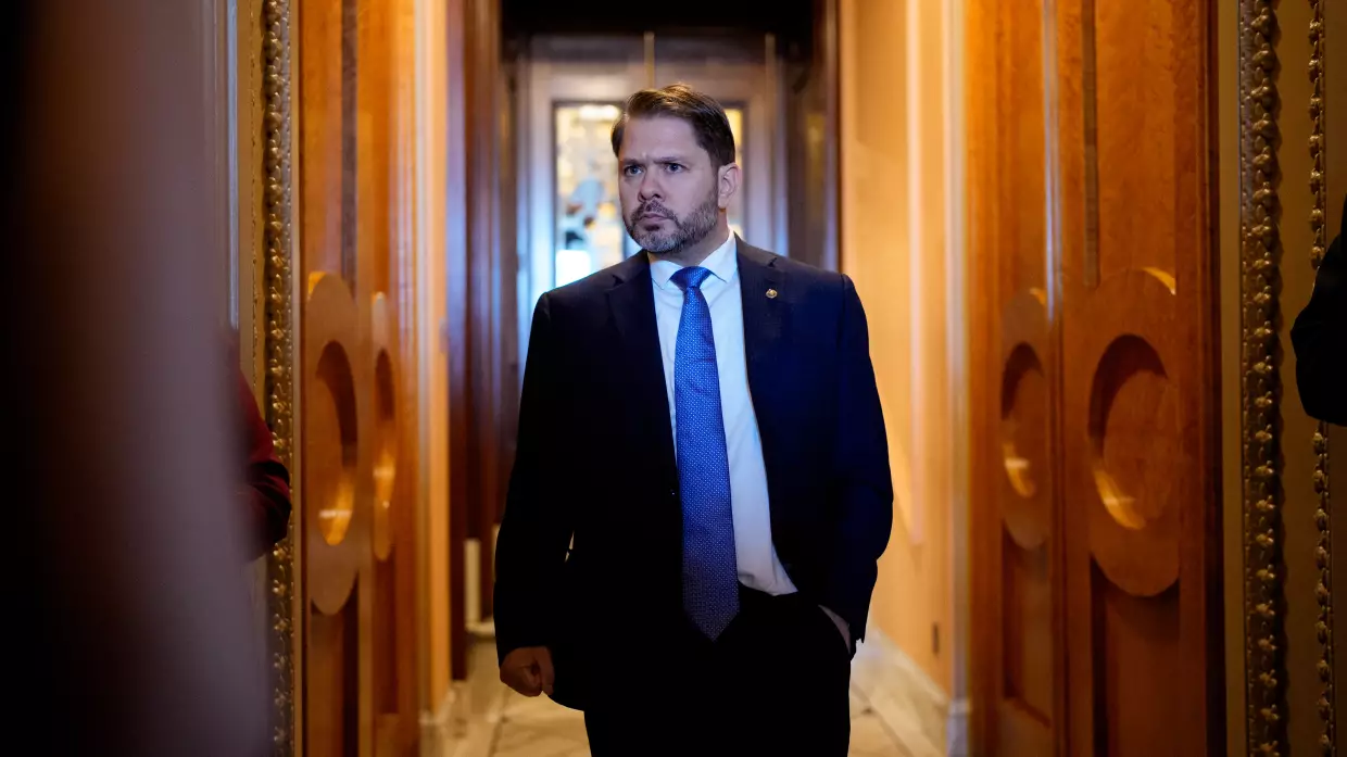 Sen. Ruben Gallego, D-Ariz., walks out of the Senate chamber on Oct. 1, 2025.