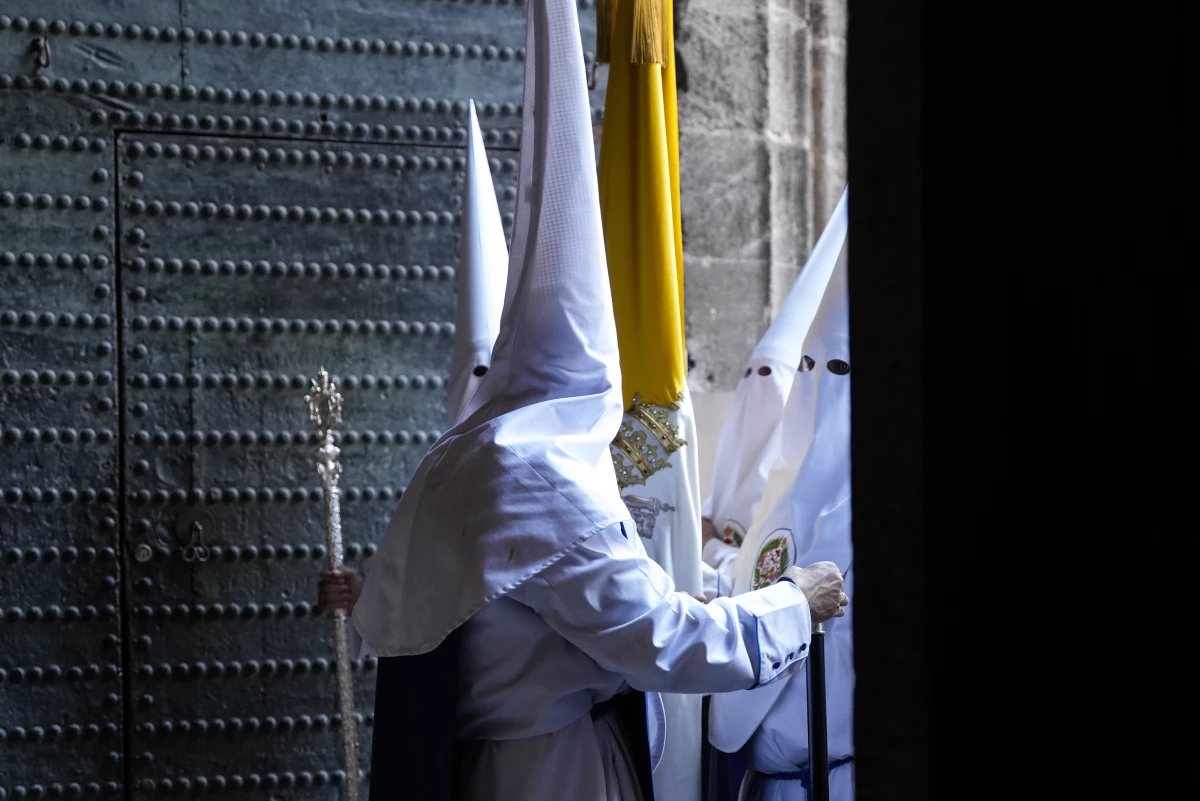 Members of the Brotherhood of Los Negritos wear the pointed hoods traditionally worn in Semana Santa processions. To the American eye, they recall Ku Klux Klan costumes but date much farther back than the American hate group.