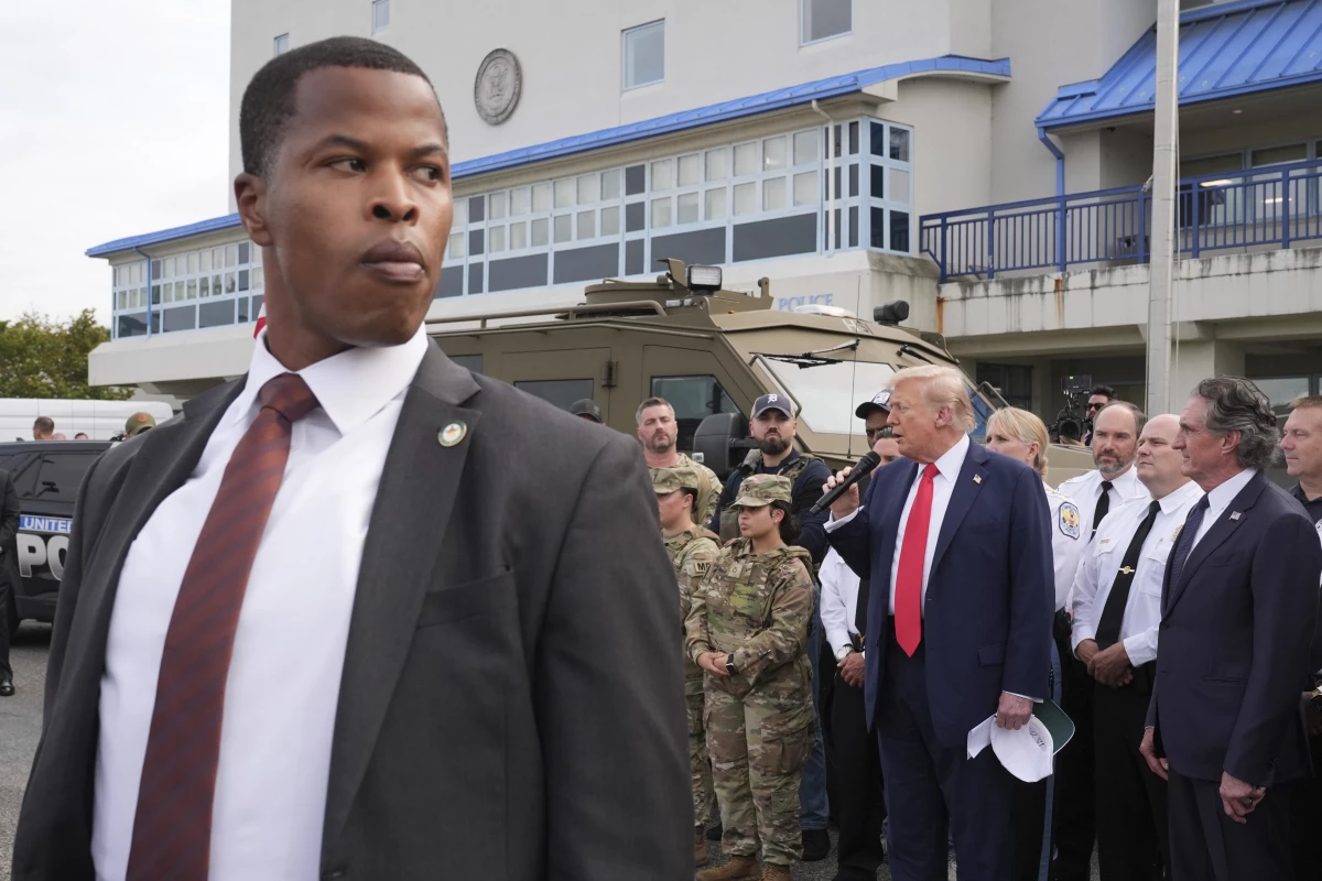 President Trump speaks with members of law enforcement and National Guard soldiers on Aug. 21, 2025, in Washington.