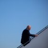 President Trump boards Air Force One after speaking to reporters on Wednesday.