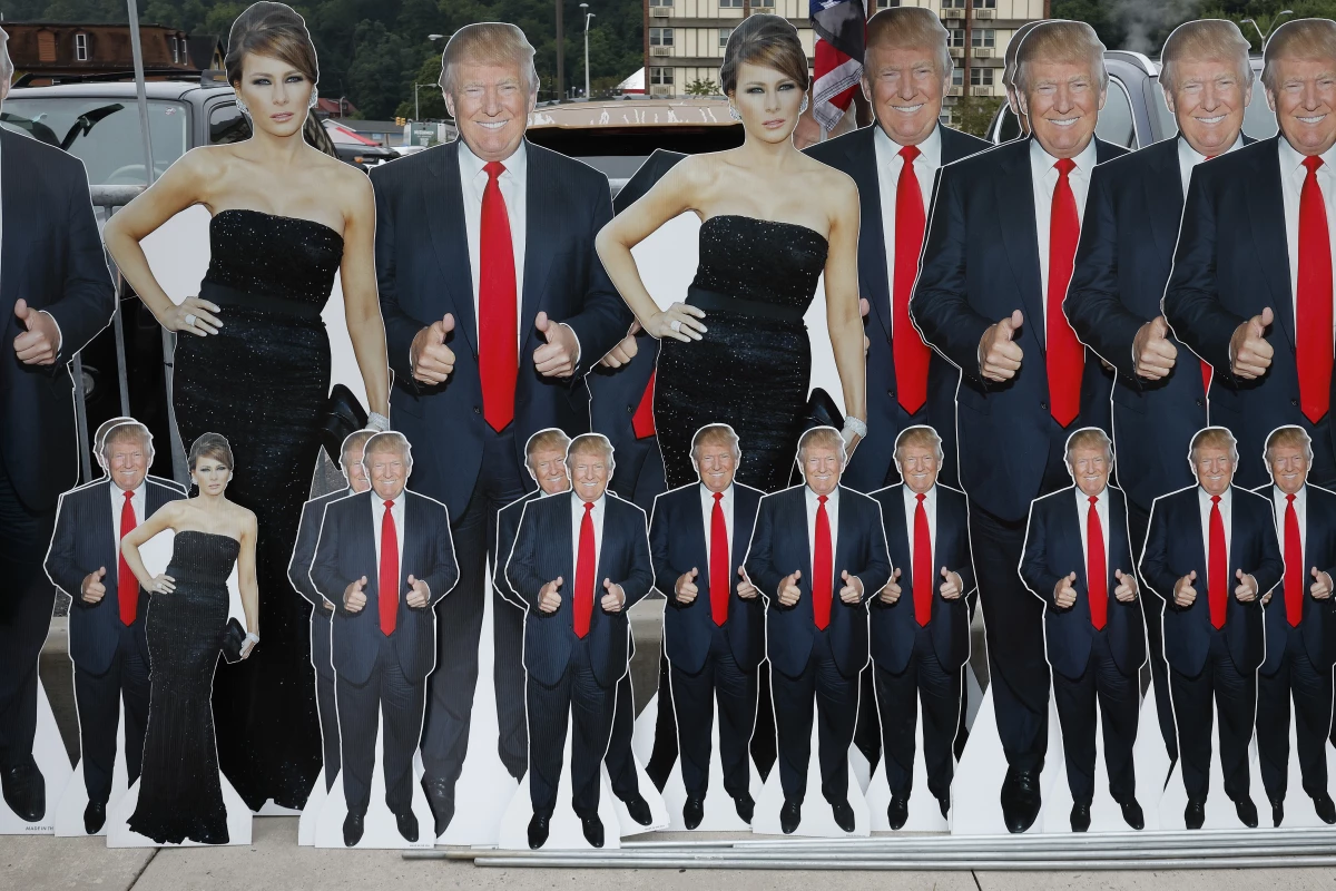 “Why should anyone other than the woman herself have the power to determine what she does with her own body?' Melania Trump asks in her new memoir, according to an early excerpt published by The Guardian. The former first lady is seen here alongside her husband, former President Donald Trump, in cardboard cutouts at a campaign rally in Johnstown, Pa.