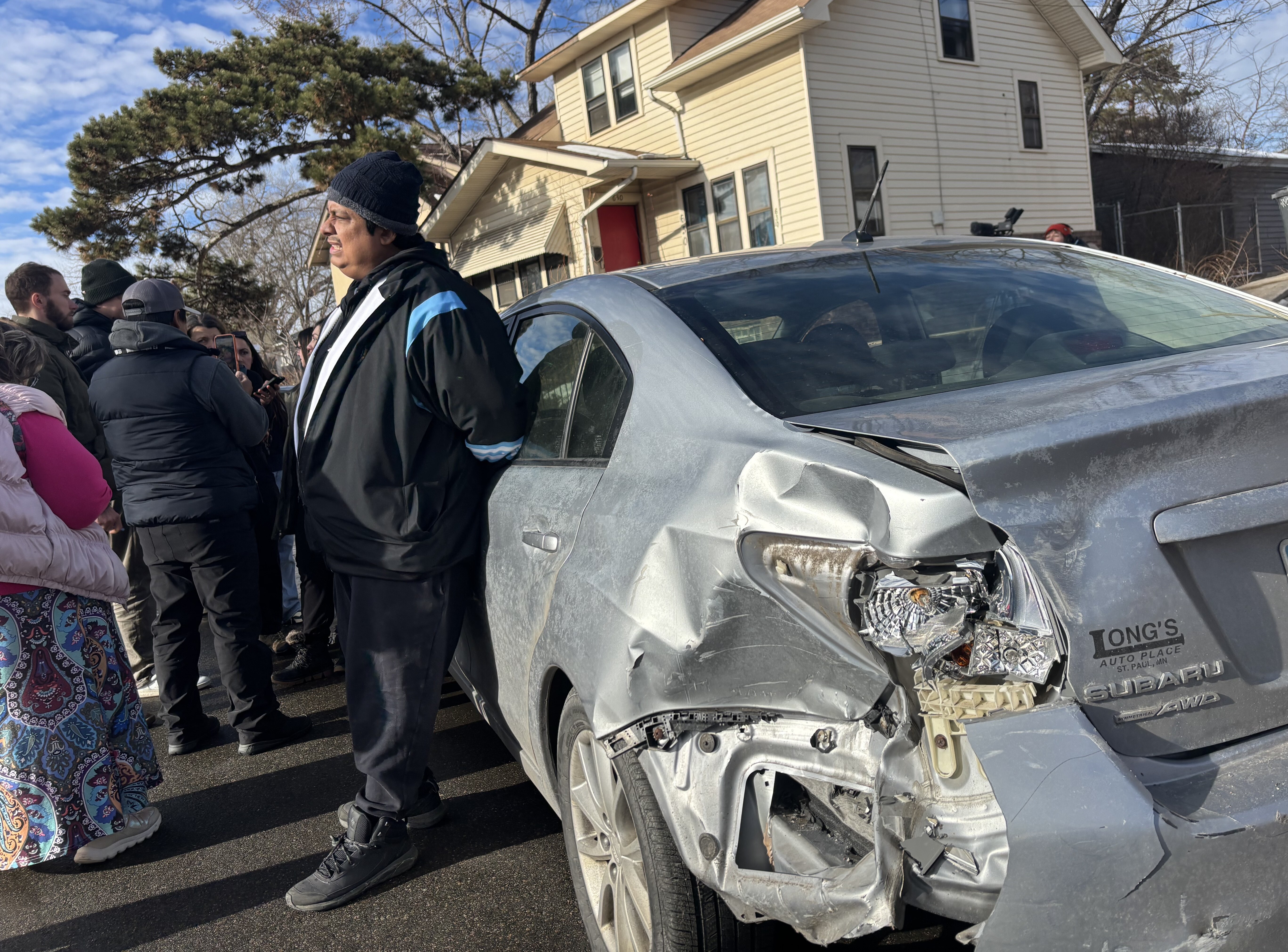 Christian Molina says federal immigration agents crashed into his car when he refused to stop for them in Minneapolis in January.