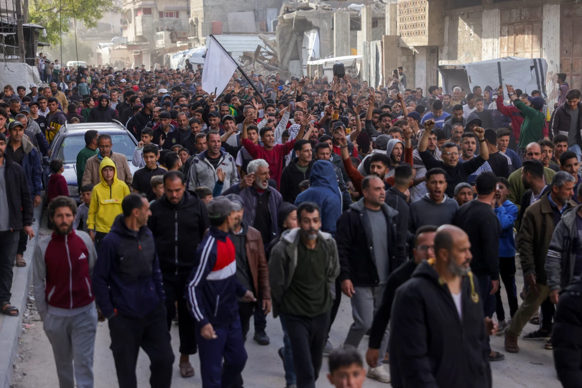 Palestinians attend a rally calling for an end to the war, in Beit Lahia, in the northern Gaza Strip, on Wednesday. Hundreds of Palestinians chanted anti-Hamas slogans, calling for an end to the war with Israel, witnesses said.