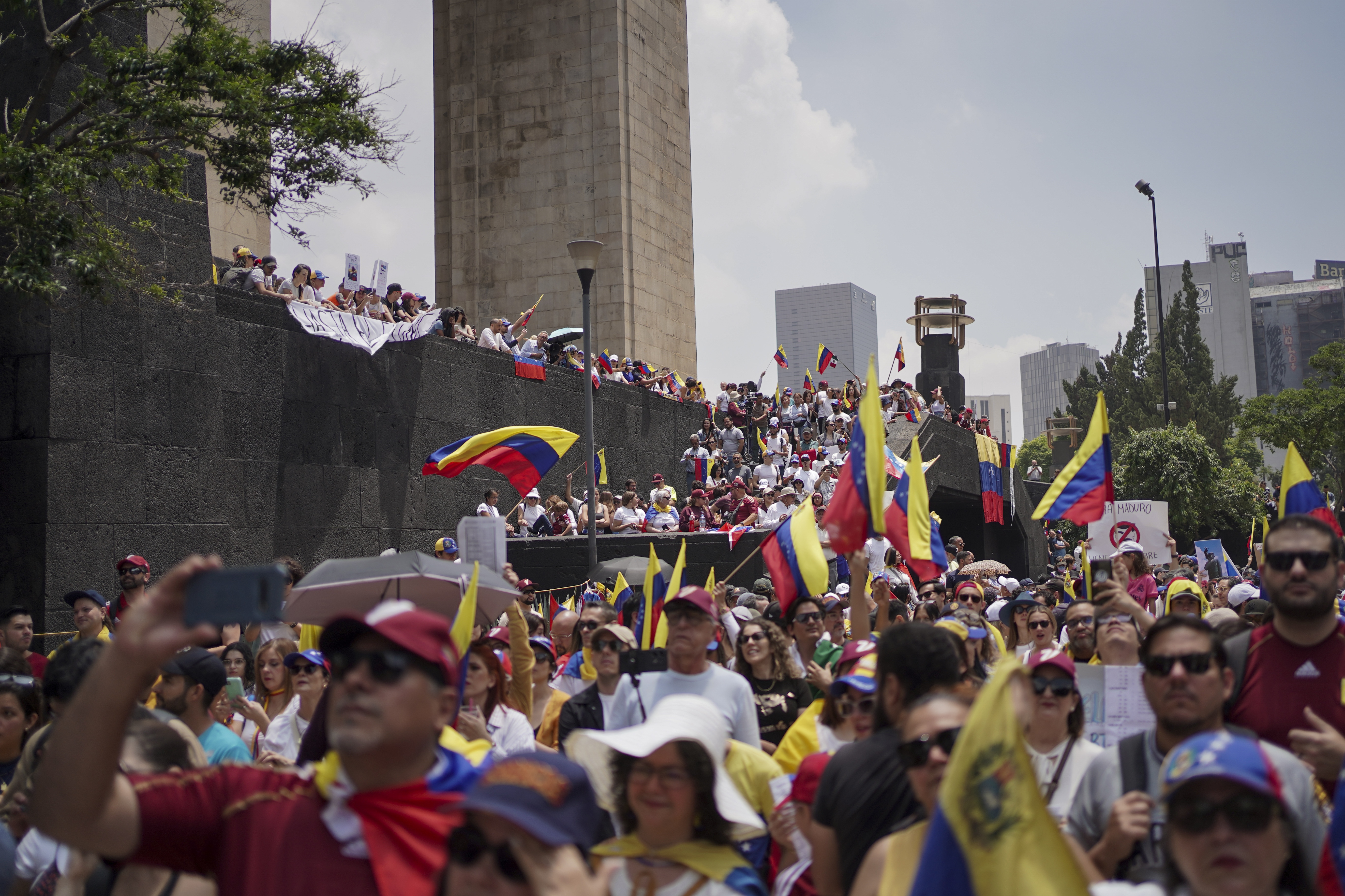Venezuelan nationals protest against the official results that declared President Nicolas Maduro the winner of the July presidential election, in Mexico City, on Saturday.