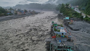 A drone view shows the aftermath of flash flooding along the Trishuli River amid a freshwater surge warning in the Trishuli Bazaar area of Nuwakot district in Nepal on Sunday.