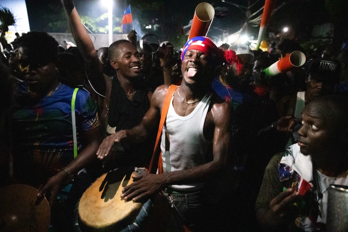 Fans cheer in the streets of Port-au-Prince on Nov. 18, 2025 as Haiti celebrates its victory over Nicaragua and qualification for the 2026 FIFA World Cup.