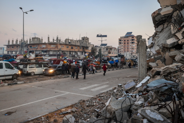 Vehicles queue up along the Salah al-Din road in Nuseirat near the Netzarim corridor while waiting to cross to the northern part of the Gaza Strip on Jan. 27, 2025.